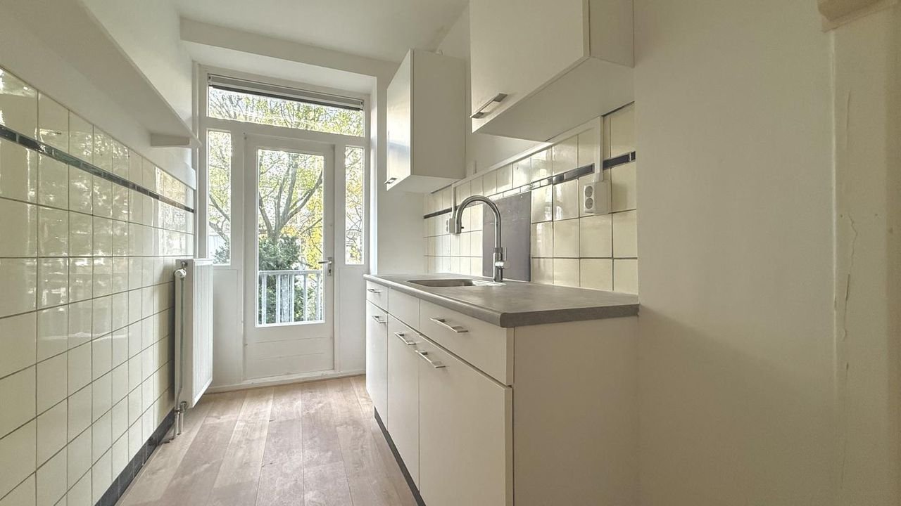 Licht appartement in de Erasmusparkbuurt - Afbeelding 9