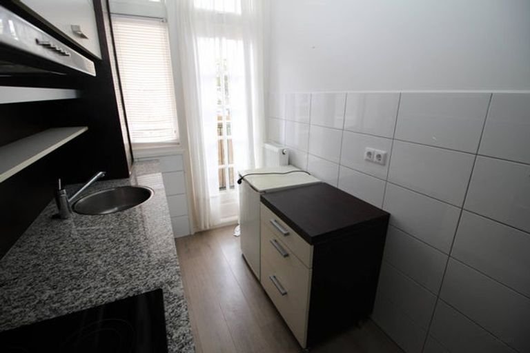 En-suite appartement met balkon in Bezuidenhout - Afbeelding 12