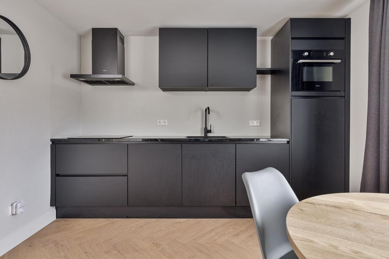 Gloednieuw appartement met groot dakterras - Afbeelding 10