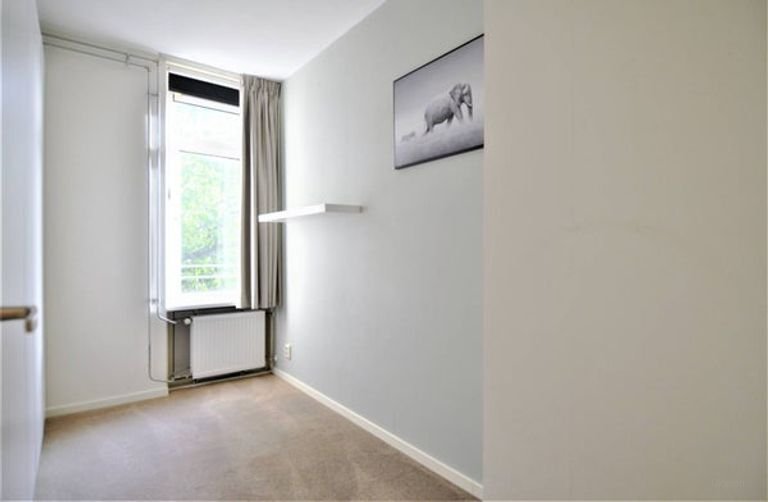 Licht appartement met twee balkons in Buitenveldert - Afbeelding 23