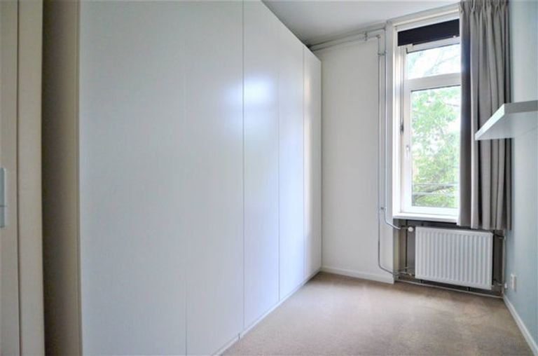 Licht appartement met twee balkons in Buitenveldert - Afbeelding 24