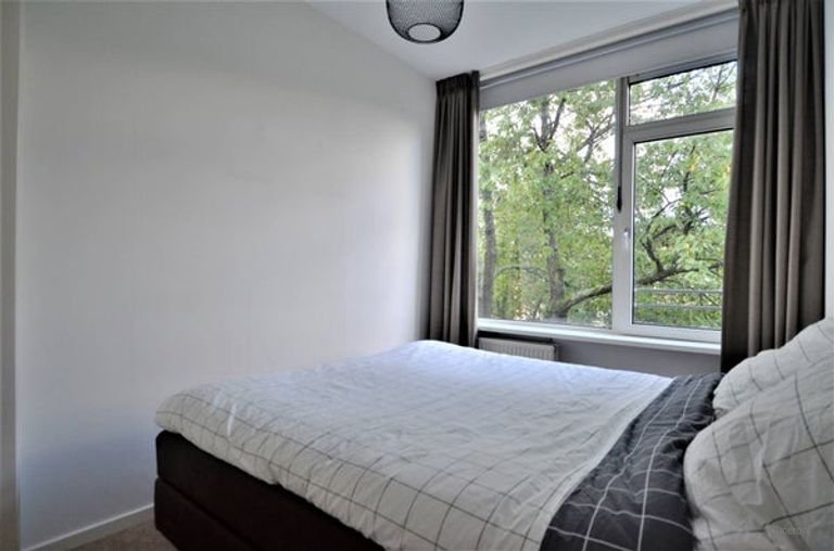 Licht appartement met twee balkons in Buitenveldert - Afbeelding 35