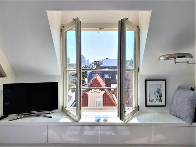 Lichte studio met dakterras bij de Amstel - Afbeelding 14