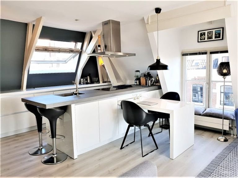 Lichte studio met dakterras bij de Amstel - Afbeelding 2