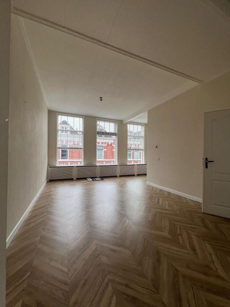 Bovenwoning met royaal dakterras in Stad - Afbeelding 2