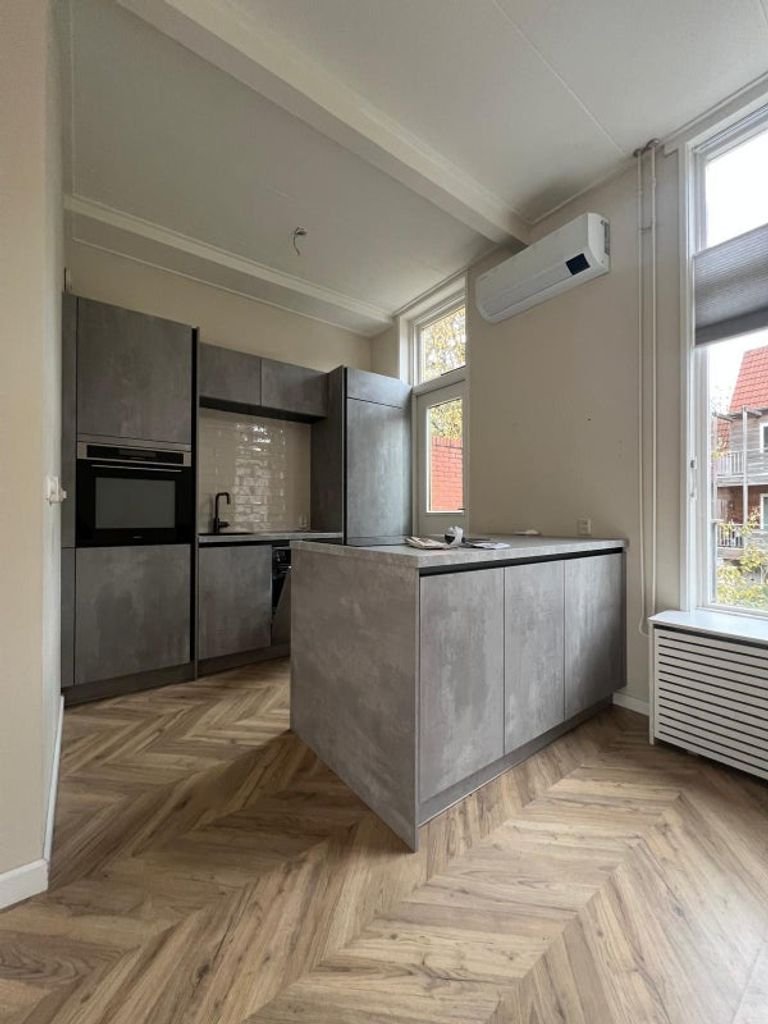 Bovenwoning met royaal dakterras in Stad - Afbeelding 1