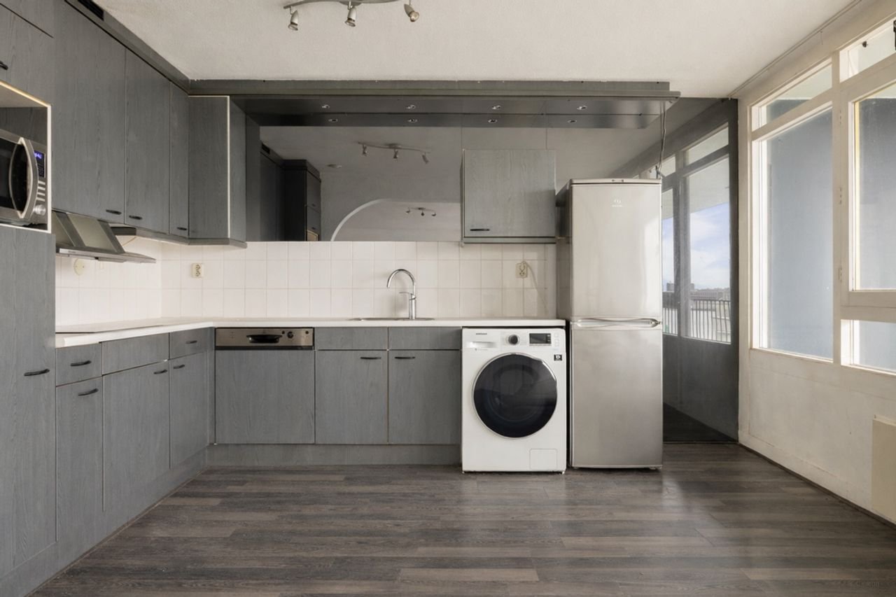 Licht appartement met uitzicht op 't IJ - Afbeelding 9