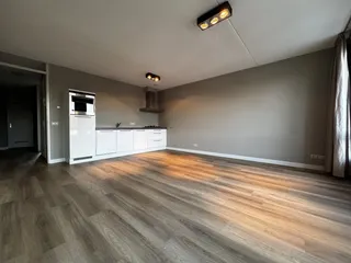 Modern corner apartment with private parking space