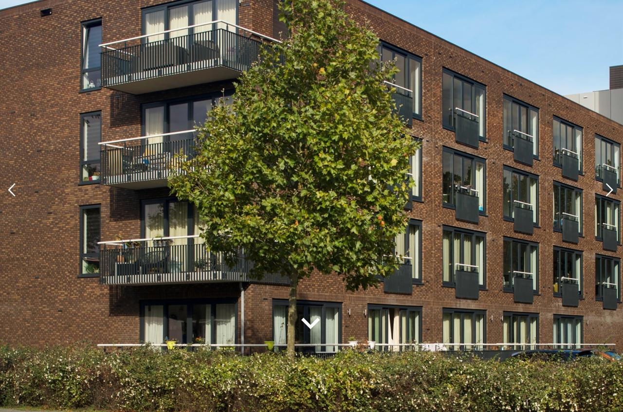 Hoekappartement met eigen parkeerplaats - Afbeelding 1
