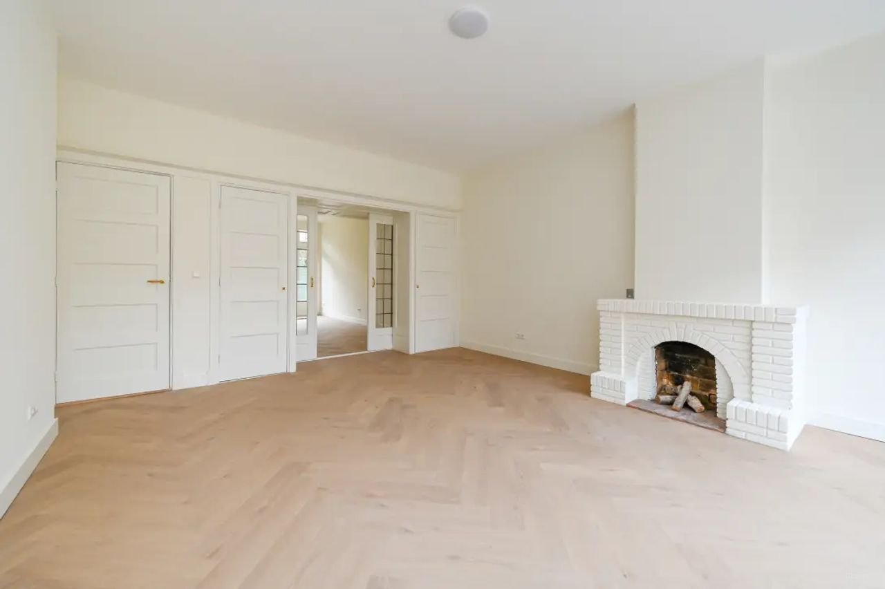 Gerenoveerde benedenwoning met grote tuin - Afbeelding 1