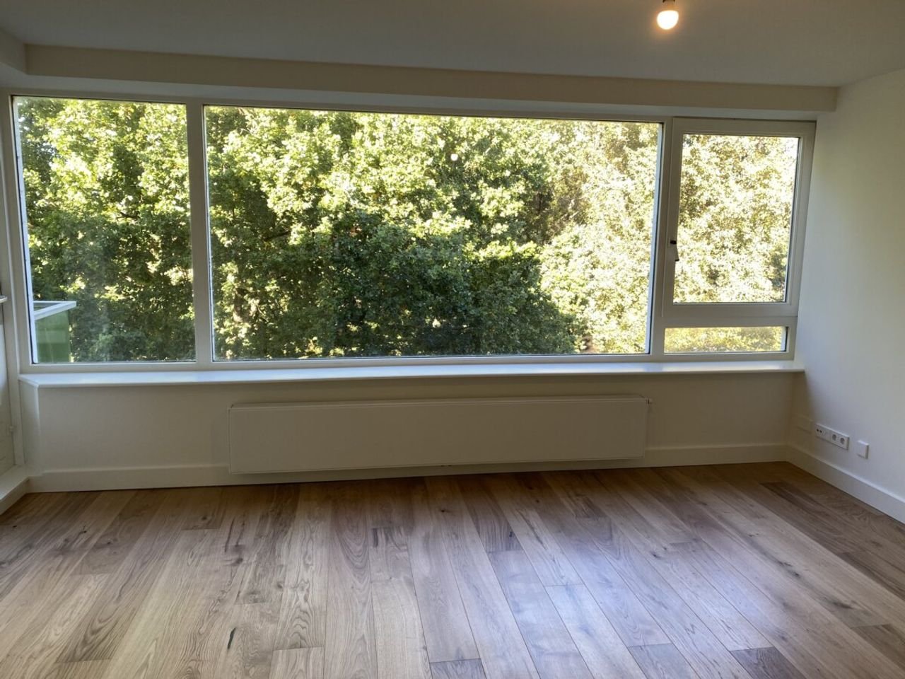 Renovated 3-room apartment with green views - Image 4