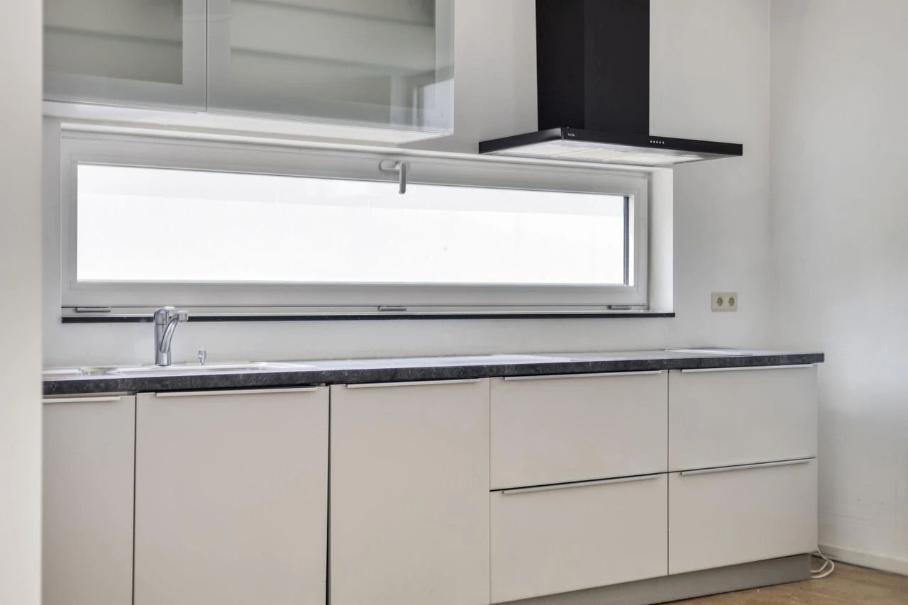 Licht appartement aan Herdenkingsplein - Afbeelding 14