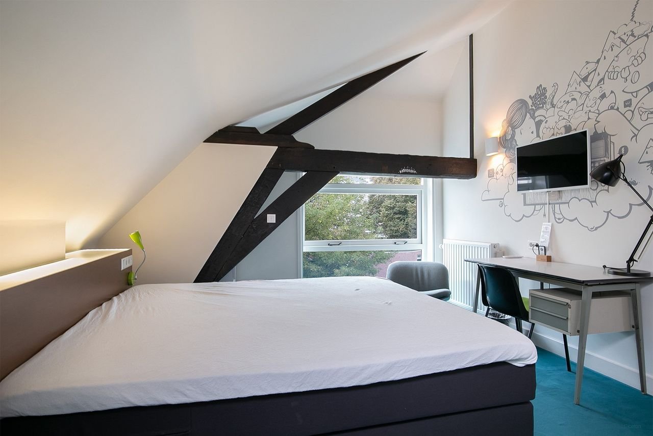 Luxe studio aan de Oudegracht met tuin - Afbeelding 7