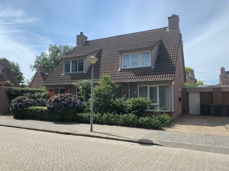 Zonnige tweekapper in groen Acht - Afbeelding 1