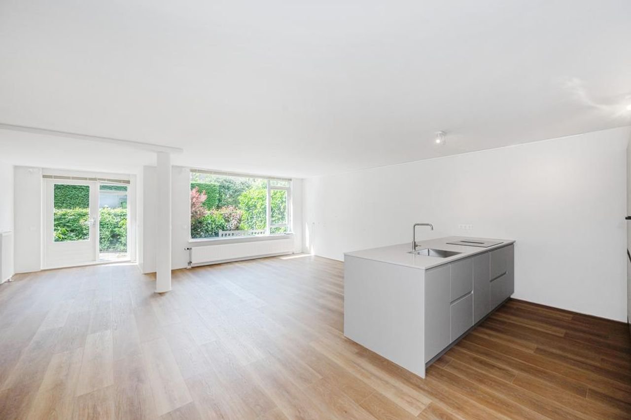 Ruime benedenwoning (93 m²) met tuin en parking - Afbeelding 2