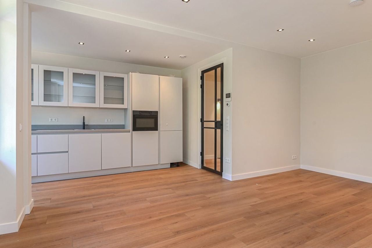 Benedenwoning van 105 m² met royale tuin - Afbeelding 1