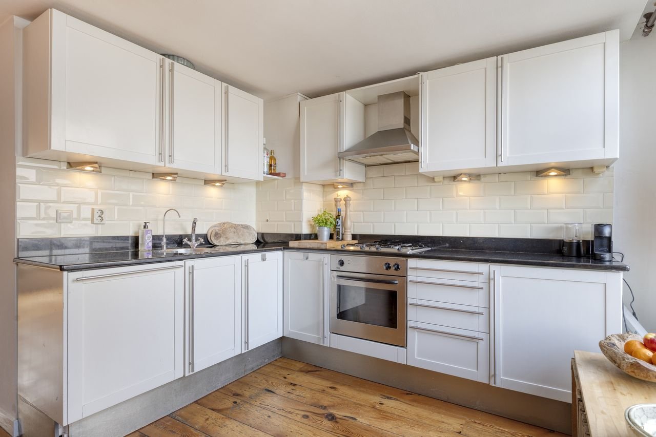 Lichte short-stay met terras in Haarlemmerbuurt - Afbeelding 9