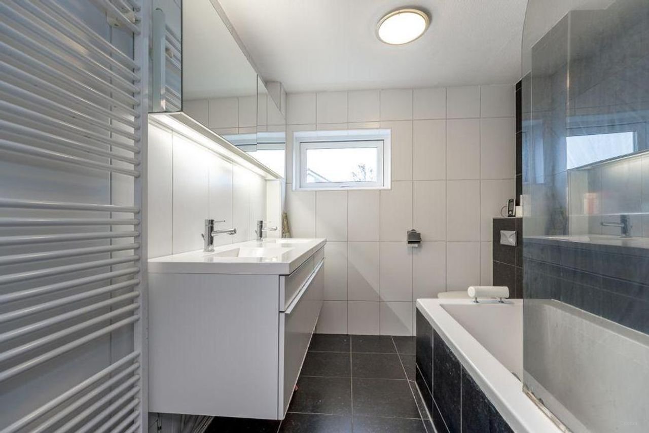 Dwarskapwoning met garage in Muziekwijk - Afbeelding 17