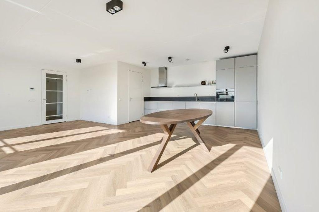 Licht appartement met garage en balkon - Afbeelding 2