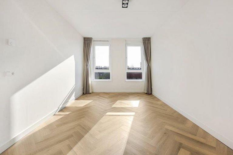 Licht appartement met garage en balkon - Afbeelding 6