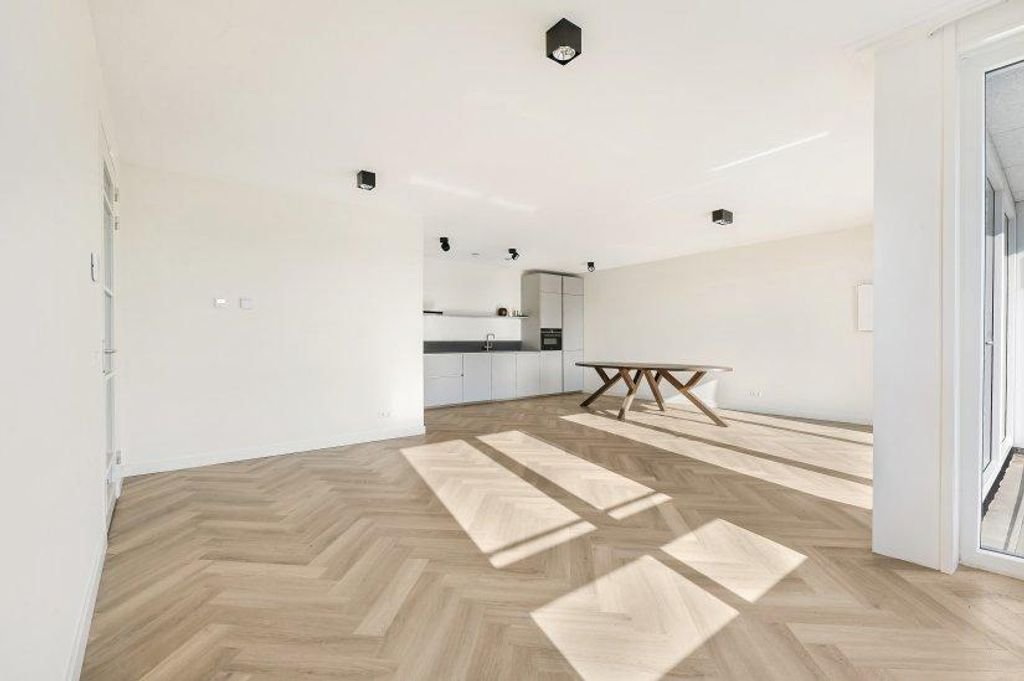 Licht appartement met garage en balkon - Afbeelding 1