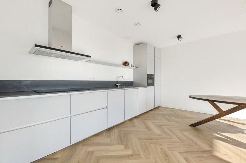 Licht appartement met garage en balkon - Afbeelding 3