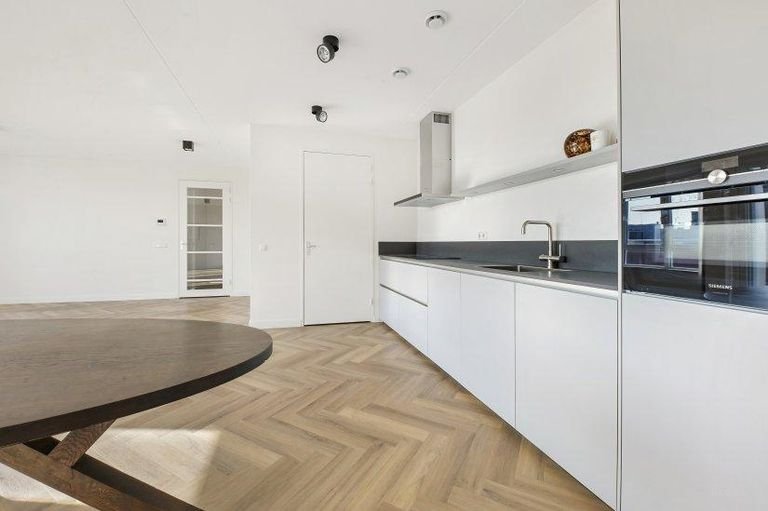 Licht appartement met garage en balkon - Afbeelding 5