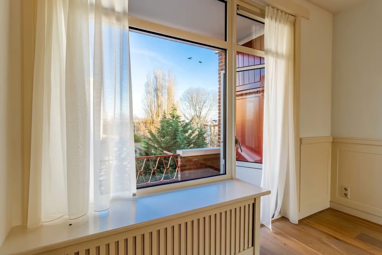 Topetage van 95m² in de Bloemenbuurt - Afbeelding 13