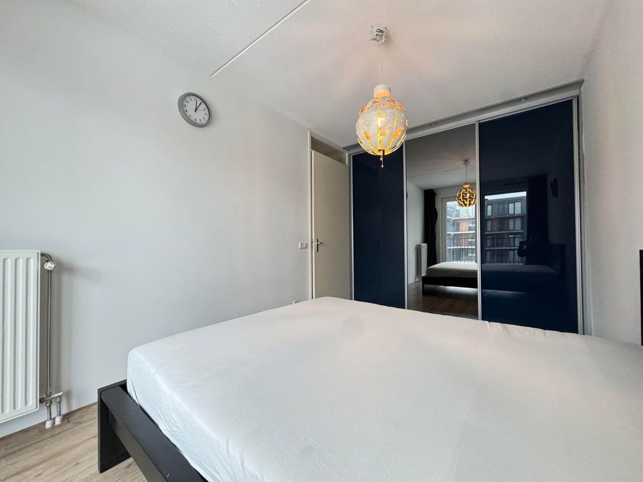 Ruim appartement (112m²) met parking - Afbeelding 17