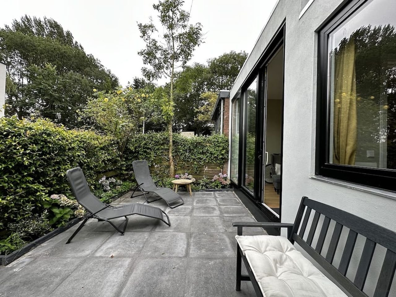 Modern benedenhuis met tuin in Zuid - Afbeelding 1