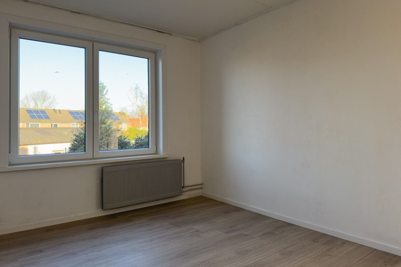 Fijne woning met garage en nieuwe keuken - Afbeelding 12