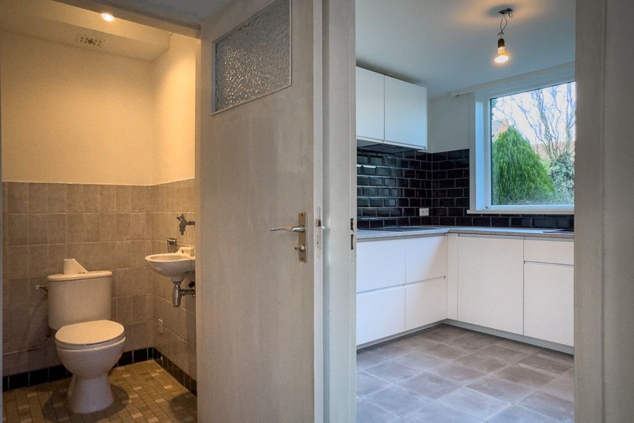 Fijne woning met garage en nieuwe keuken - Afbeelding 8