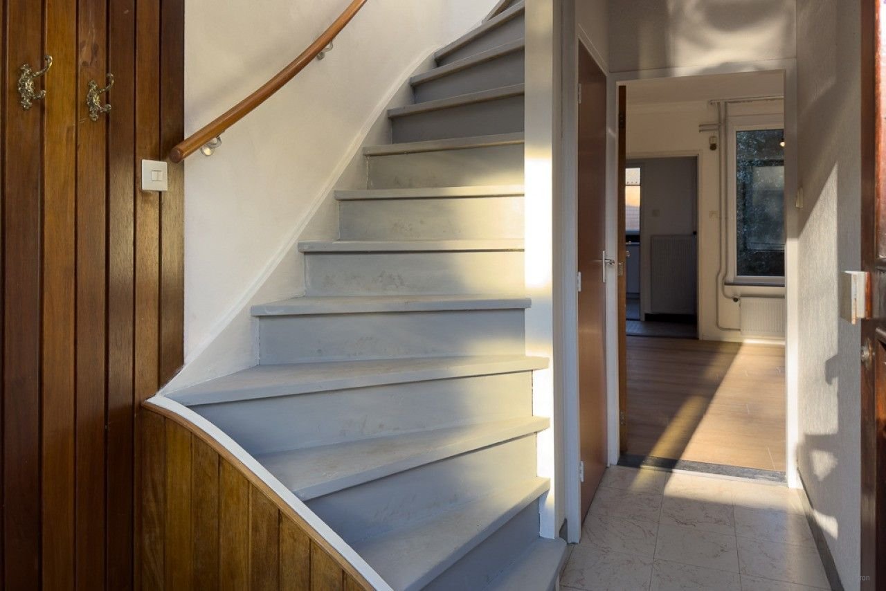 Fijne woning met garage en nieuwe keuken - Afbeelding 7