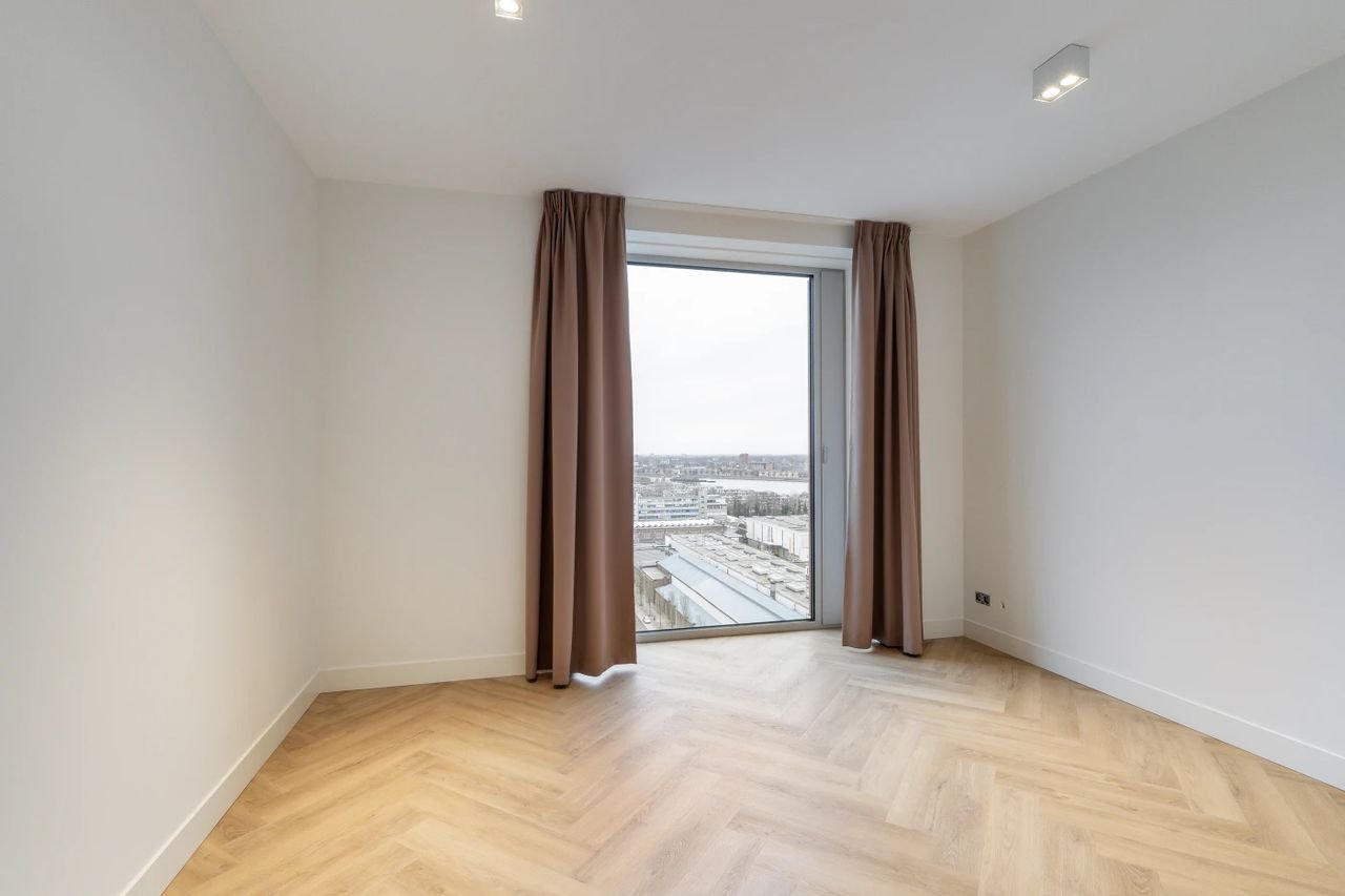 Nieuwbouw op de 16e etage met uitzicht over de Maas - Afbeelding 12