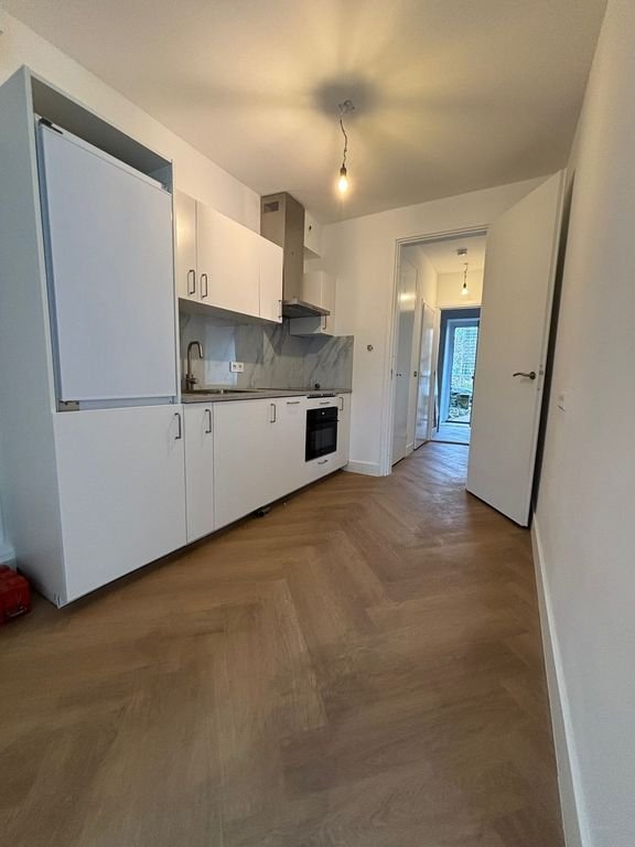 Gerenoveerde benedenwoning met tuin - Afbeelding 4