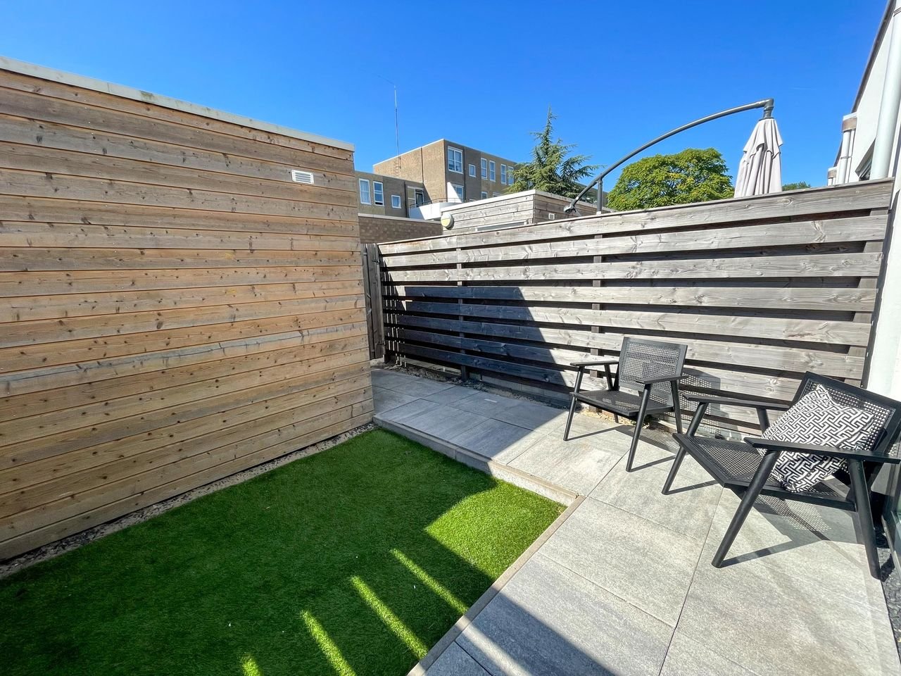 Gemeubileerde woning met tuin bij NDSM - Afbeelding 14