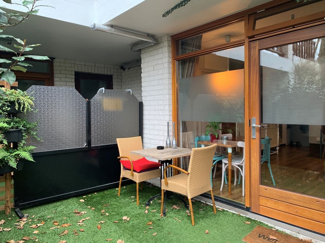 Gemeubileerde benedenwoning met tuin - Afbeelding 1