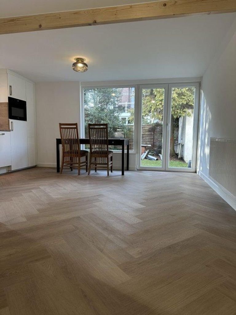 Modern appartement met tuin vlakbij zee - Afbeelding 1