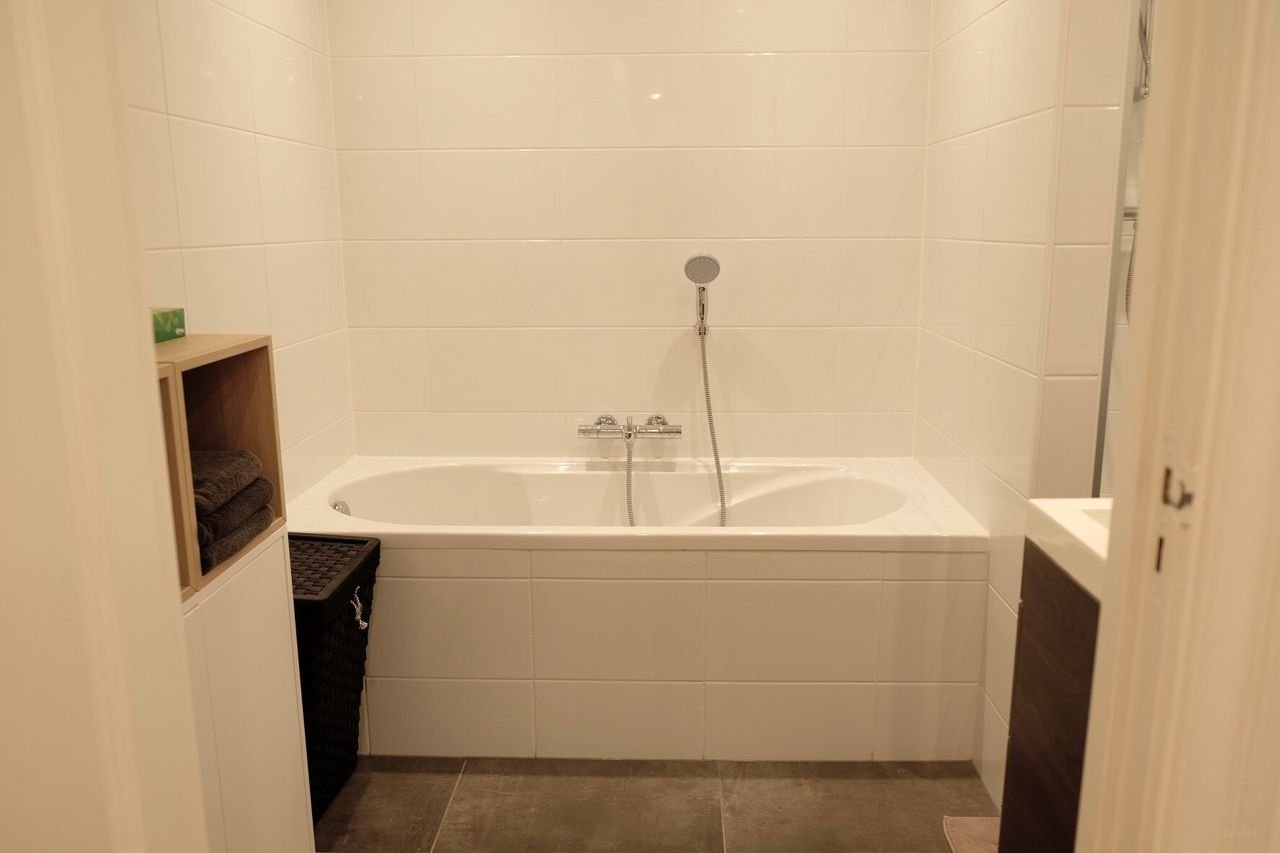 Benedenhuis met tuin bij Den Haag CS - Afbeelding 11