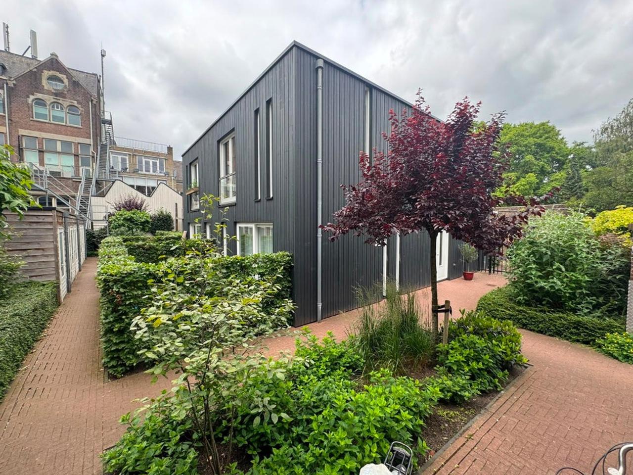 Rustig 2-kamerappartement met tuin - Afbeelding 1
