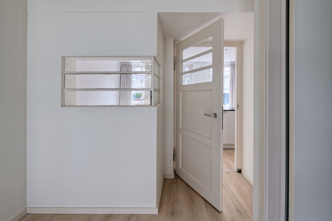 Benedenwoning in Oost met enorme tuin - Afbeelding 7