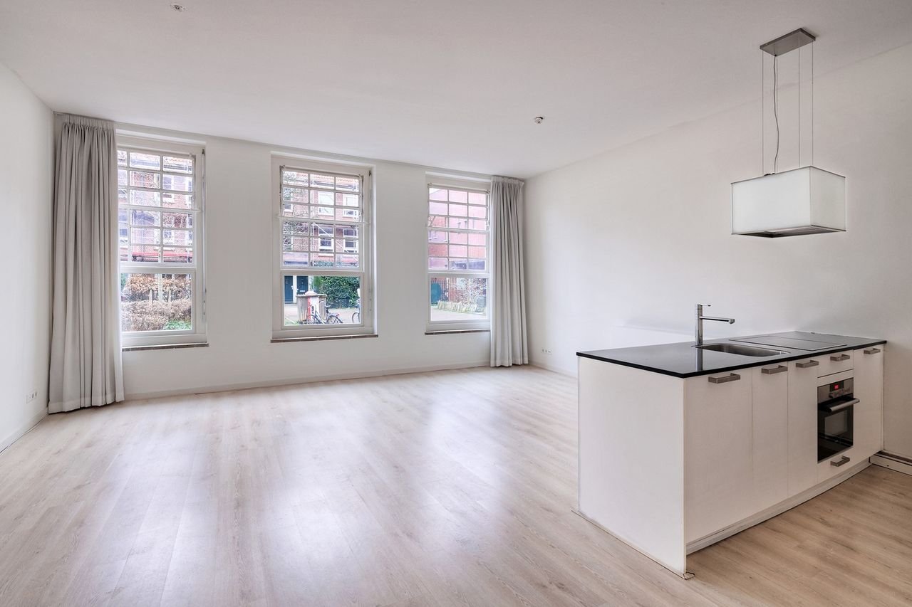 Benedenwoning in Oost met enorme tuin - Afbeelding 9