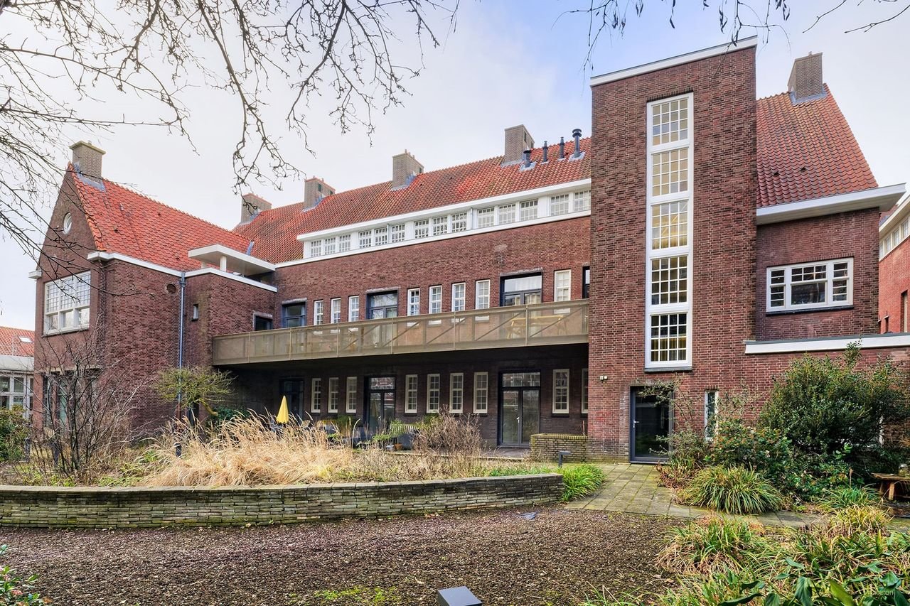 Benedenwoning in Oost met enorme tuin - Afbeelding 2