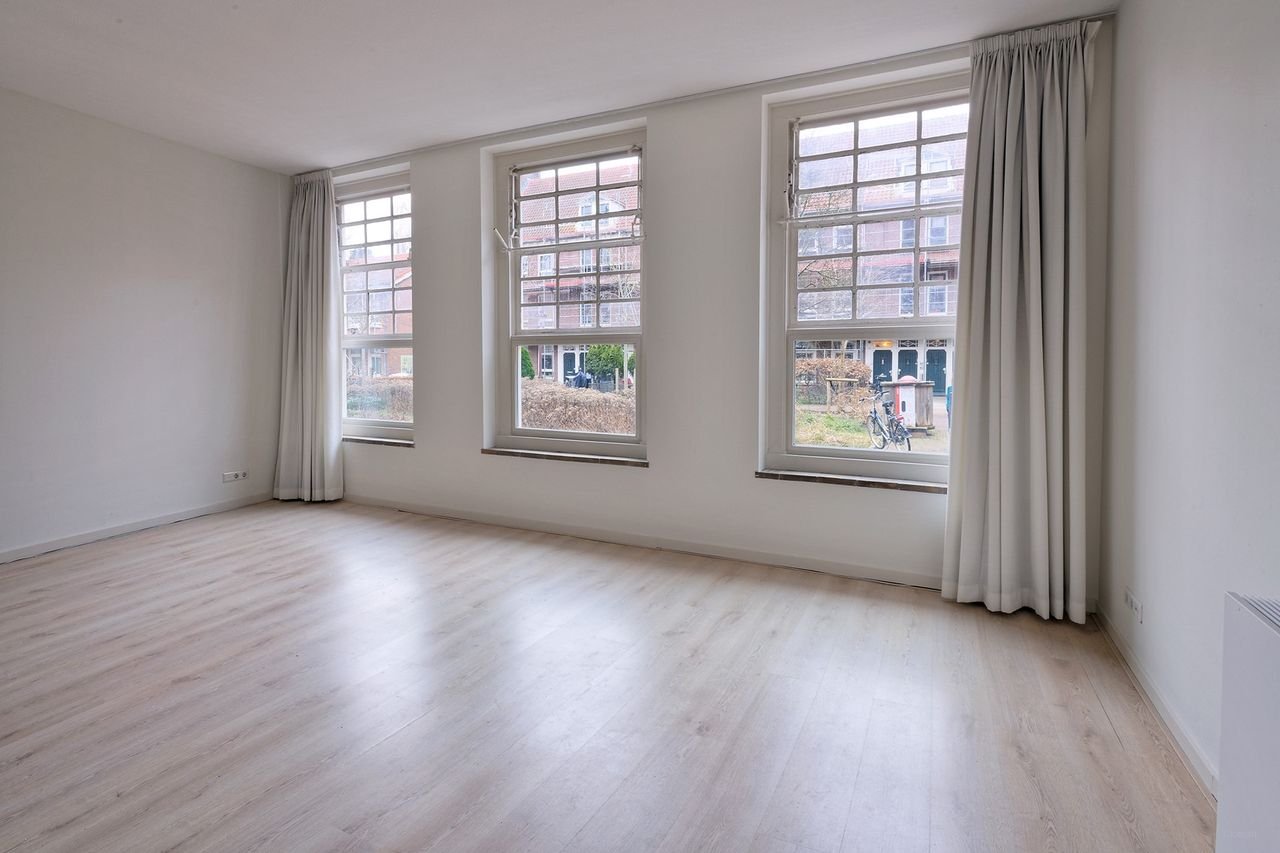 Benedenwoning in Oost met enorme tuin - Afbeelding 12