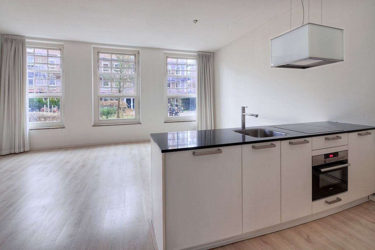 Benedenwoning in Oost met enorme tuin - Afbeelding 11