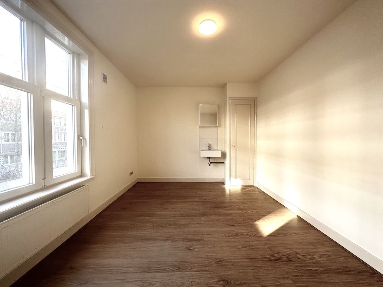 Licht appartement met 3 slaapkamers in De Baarsjes - Afbeelding 9