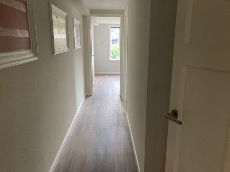 105m² wonen met eigen tuin en parkeren - Afbeelding 11