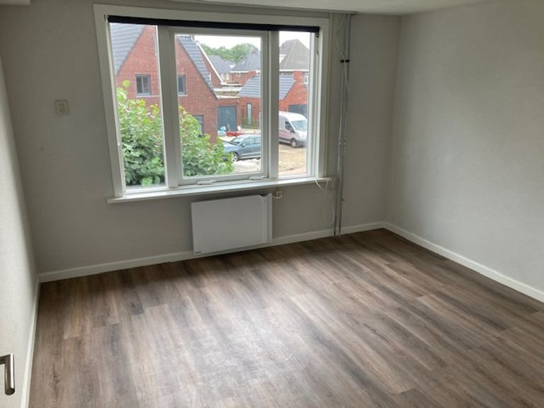 105m² wonen met eigen tuin en parkeren - Afbeelding 2