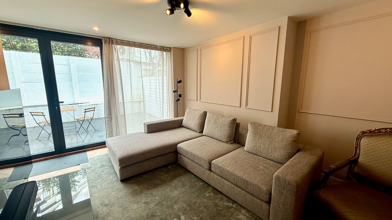 Modern benedenhuis met tuin aan de Regentesselaan - Afbeelding 2