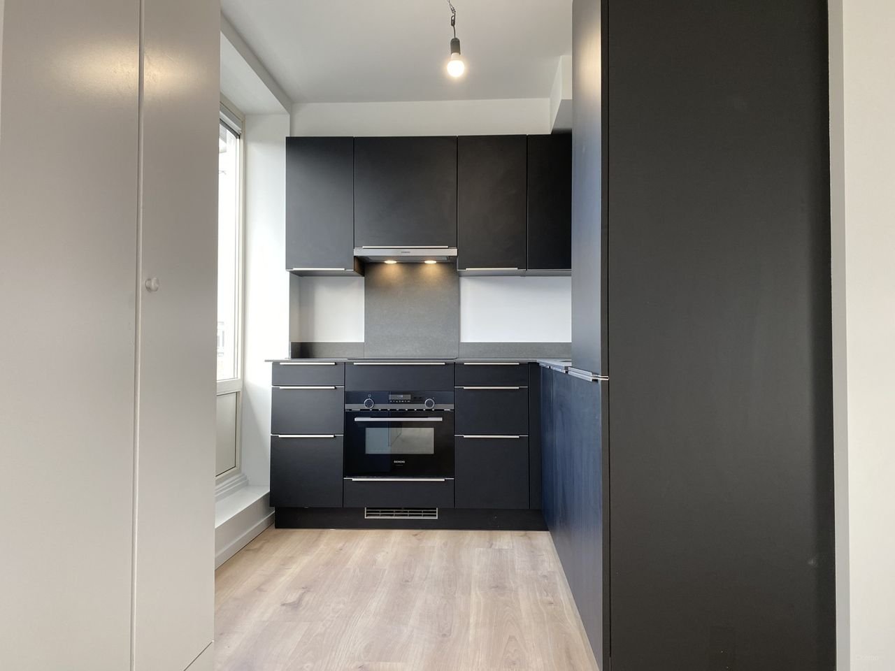 Bright top-floor apartment with a full-length balcony - Image 3